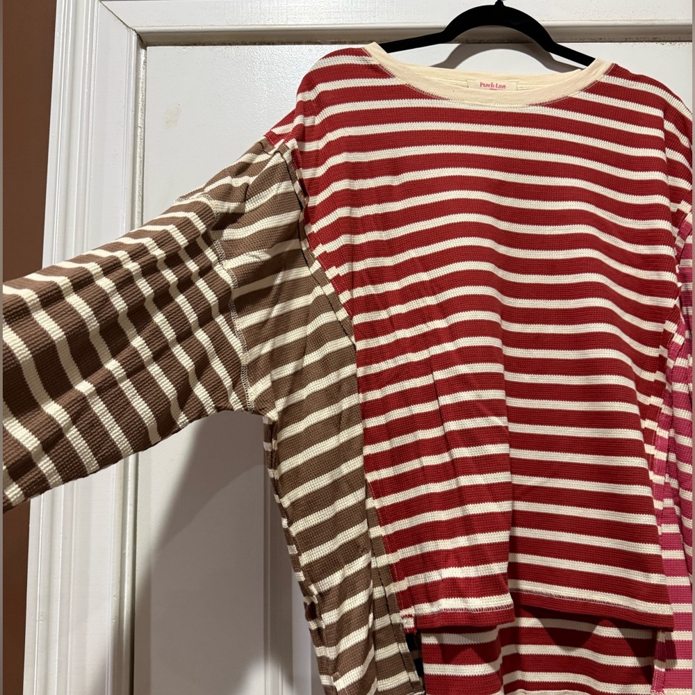 NWOT. Peach Love brand Striped Knit Top. Size Large